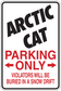 Fun sign sticker reading 'ARCTIC CAT', 'PARKING ONLY' arrows, and 'VIOLATORS...' text