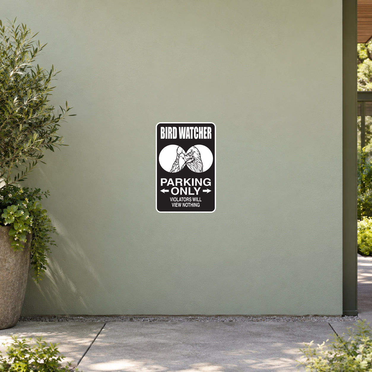 Square black sign sticker with white “BIRD WATCHER” and “PARKING ONLY” text