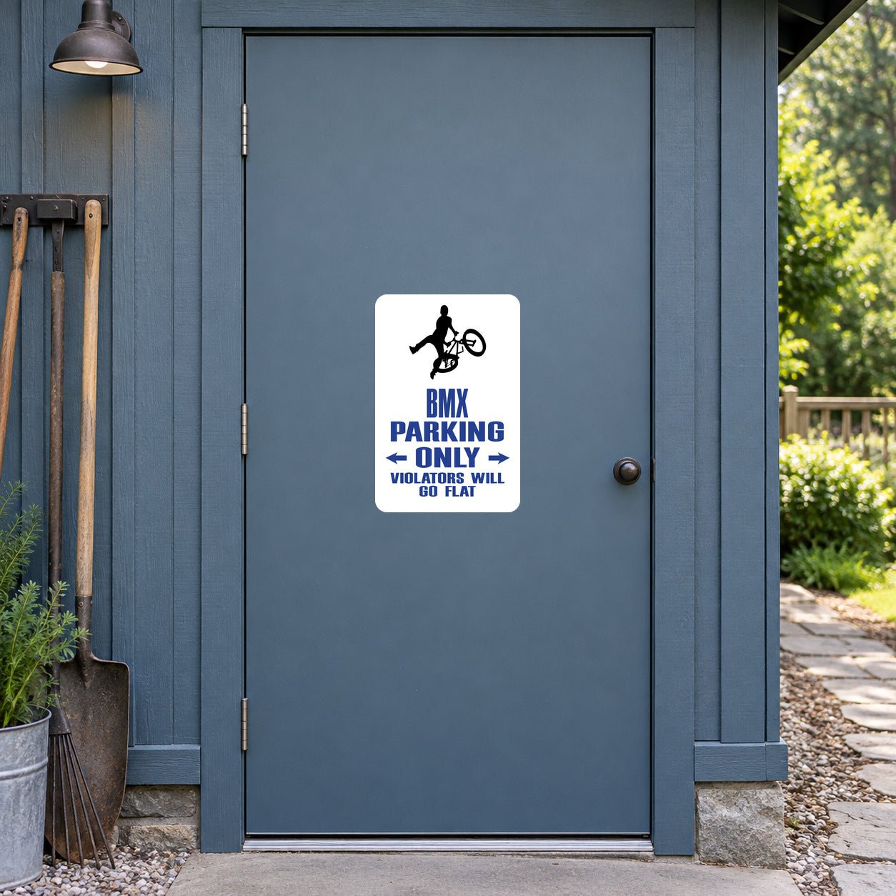 White square sign sticker with black BMX rider and "BMX parking only" text