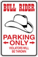 Fun sign sticker with cowboy hat silhouette and red text: BULL RIDER, PARKING ONLY.
