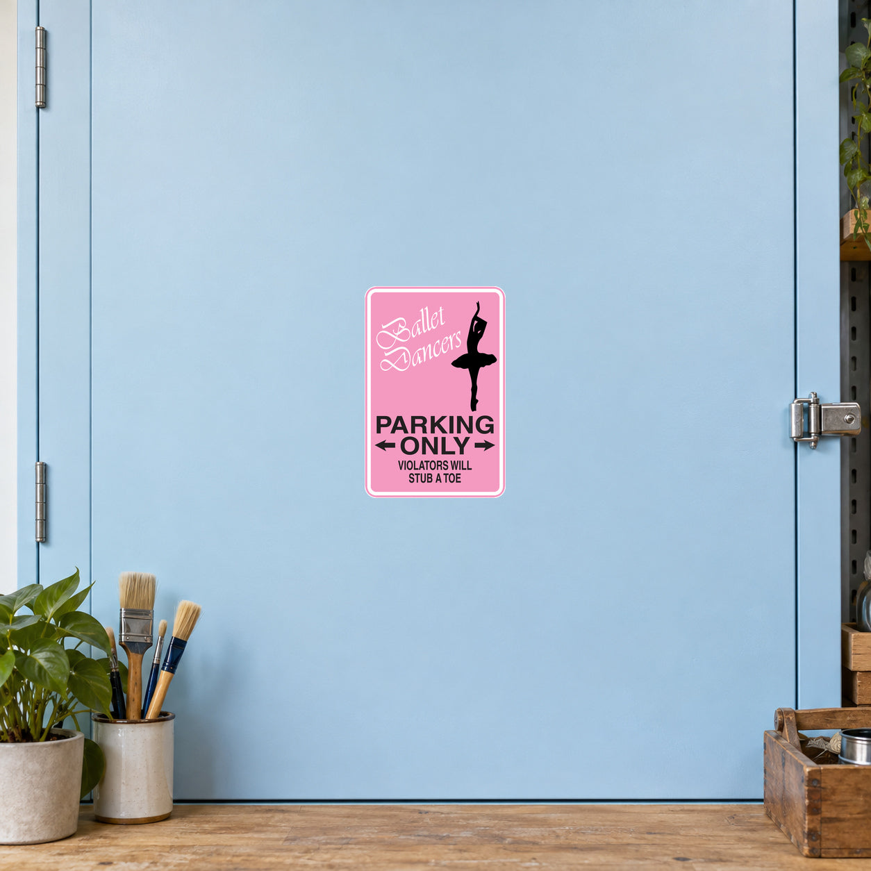 Fun Sign Sticker applied to a pale blue creative workshop cabinet