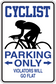 Cyclist parking only sticker sign with cyclist silhouette, arrows, and 'violators will go flat' text