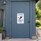 Fun Sign Sticker applied to a slate blue rural workshop door
