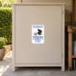 Fun Sign Sticker applied to a beige private driveway workshop cabinet