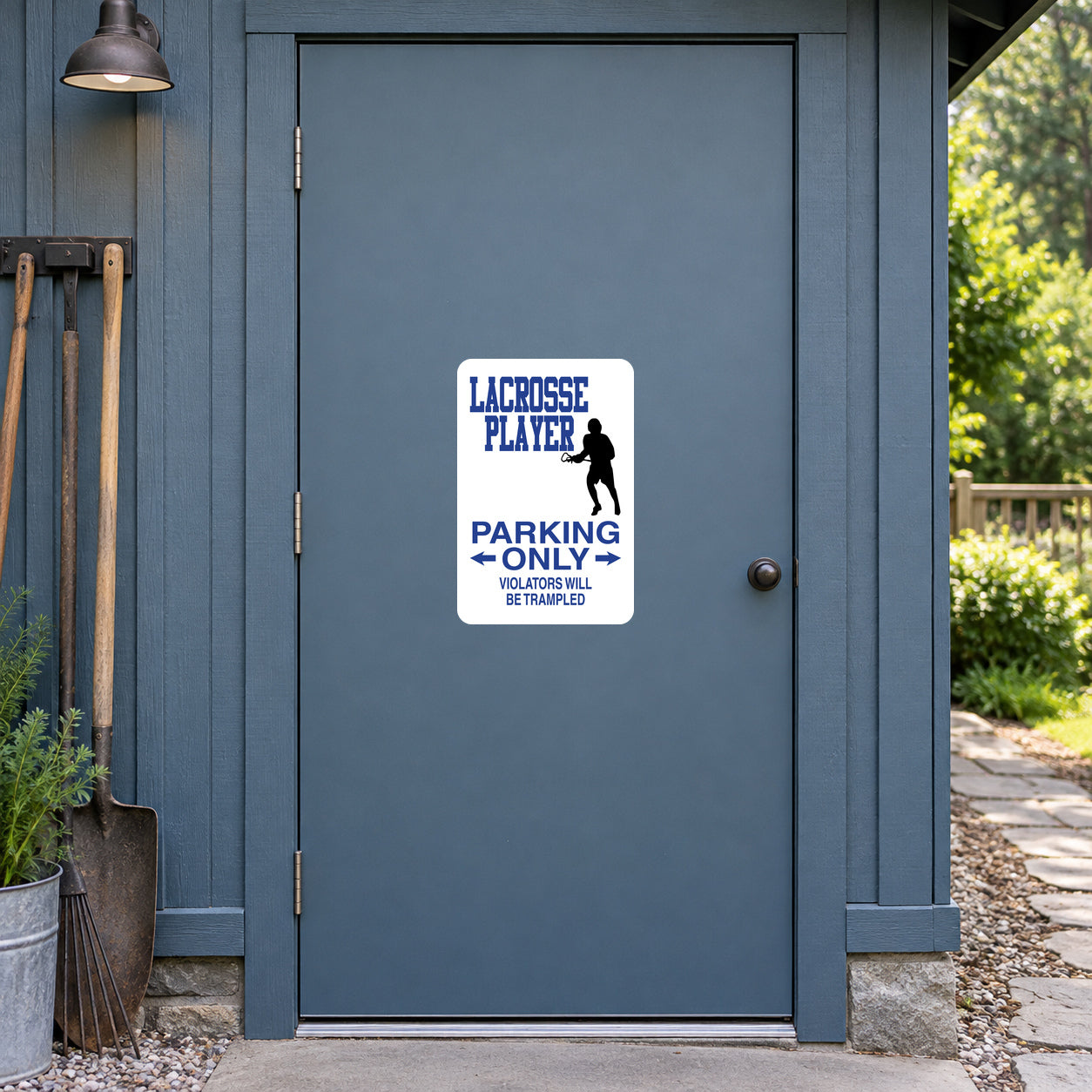 Fun Sign Sticker applied to a slate blue rural workshop door