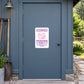 Fun Sign Sticker applied to a slate blue rural workshop door