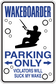 Rectangular wakeboarder parking only sticker with arrows and 'violators will suck my wake'