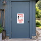 Fun Sign Sticker applied to a slate blue rural workshop door