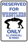 Rectangular sticker with wrestler icon and text: RESERVED FOR WRESTLERS ONLY.