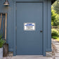 Fun Sign Sticker applied to a slate blue rural workshop door