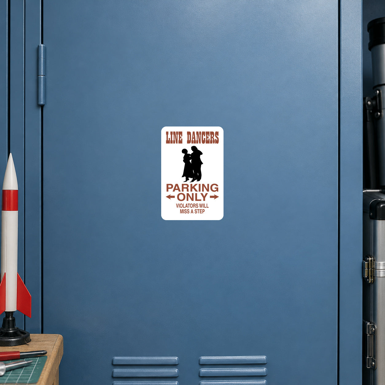 Fun Sign Sticker applied to a dusty blue hobby workshop locker