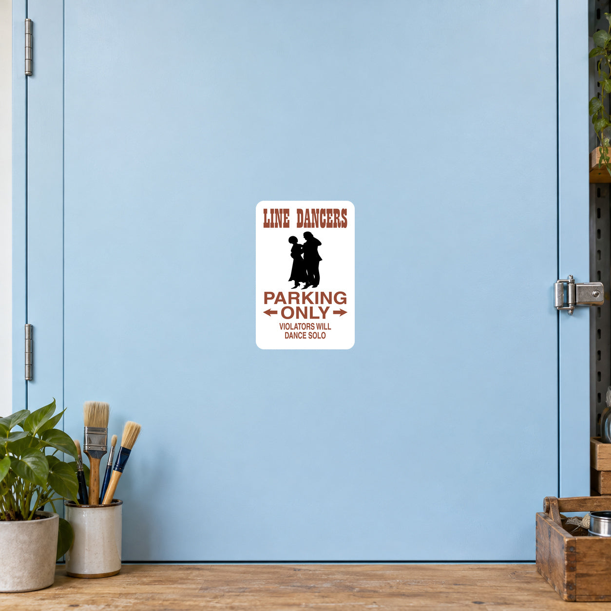 Fun Sign Sticker applied to a pale blue creative workshop cabinet