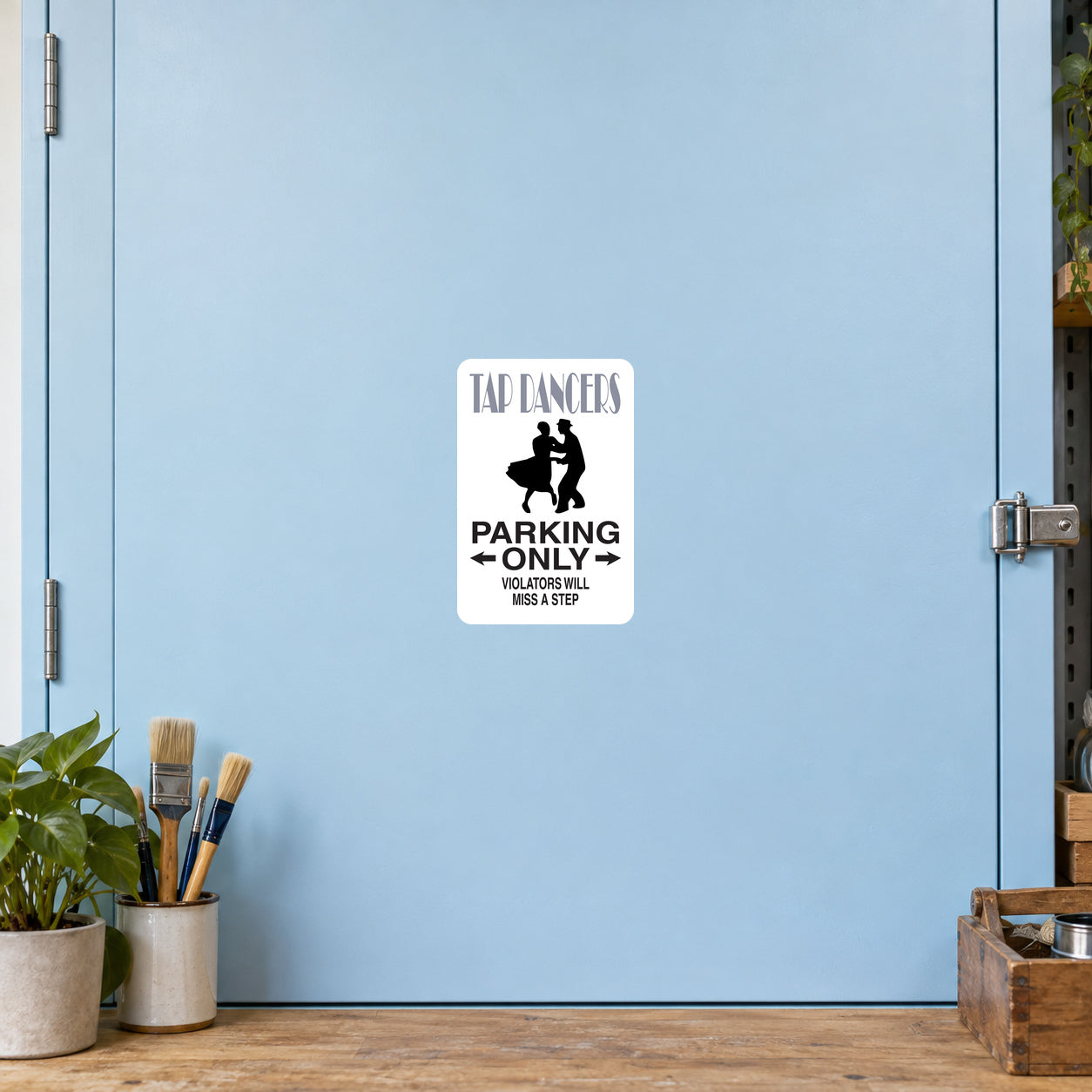 Fun Sign Sticker applied to a pale blue creative workshop cabinet