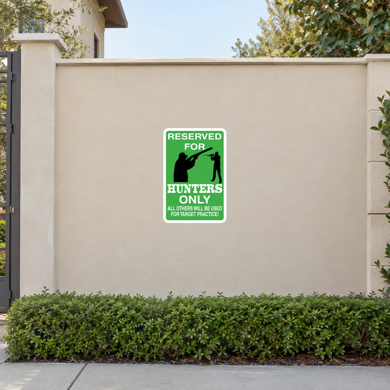 Green reserved for hunters only sign sticker with black hunting silhouette