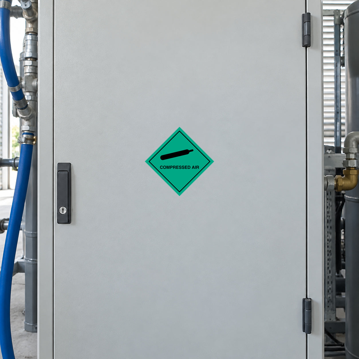 Hazardous Safety Sign Sticker applied in compressed-air service area, pale grey smooth equipment cabinet door, compressor hoses and pipework at the far edges