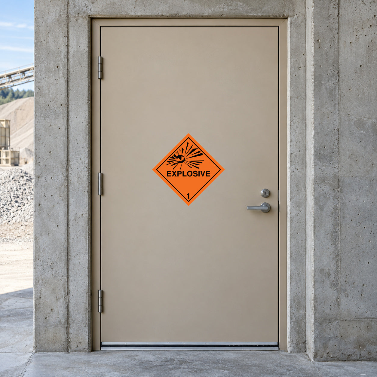 Hazardous warning sign sticker with orange explosive symbol on smooth surface