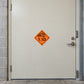 Hazard warning sign sticker: orange diamond with '1.1D' and flame icon
