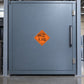 Hazardous Safety Sign Sticker applied in a secure shipping room, smooth blue grey sealed cargo cabinet front, handles far right, structural pillars at edges