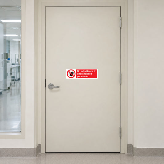 Safety sign sticker reading "No admittance to unauthorized personnel" with red ban symbol