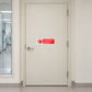 NO Safety Sign Sticker applied in a laboratory staff-only entrance, smooth ivory solid door, clinical corridor side window far left