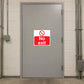 NO Safety Sign Sticker applied in a locked maintenance cupboard in a school service corridor, smooth light grey solid door, no exit hardware, electrical conduit at outside edges