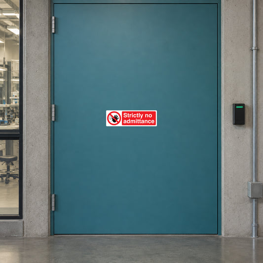 NO Safety Sign Sticker applied in private electronics laboratory entrance, solid muted teal door, access reader extreme right
