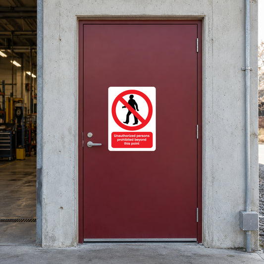 NO Safety Sign Sticker applied in railway maintenance stores entrance, solid maroon single access door, concrete frame and workshop at far left