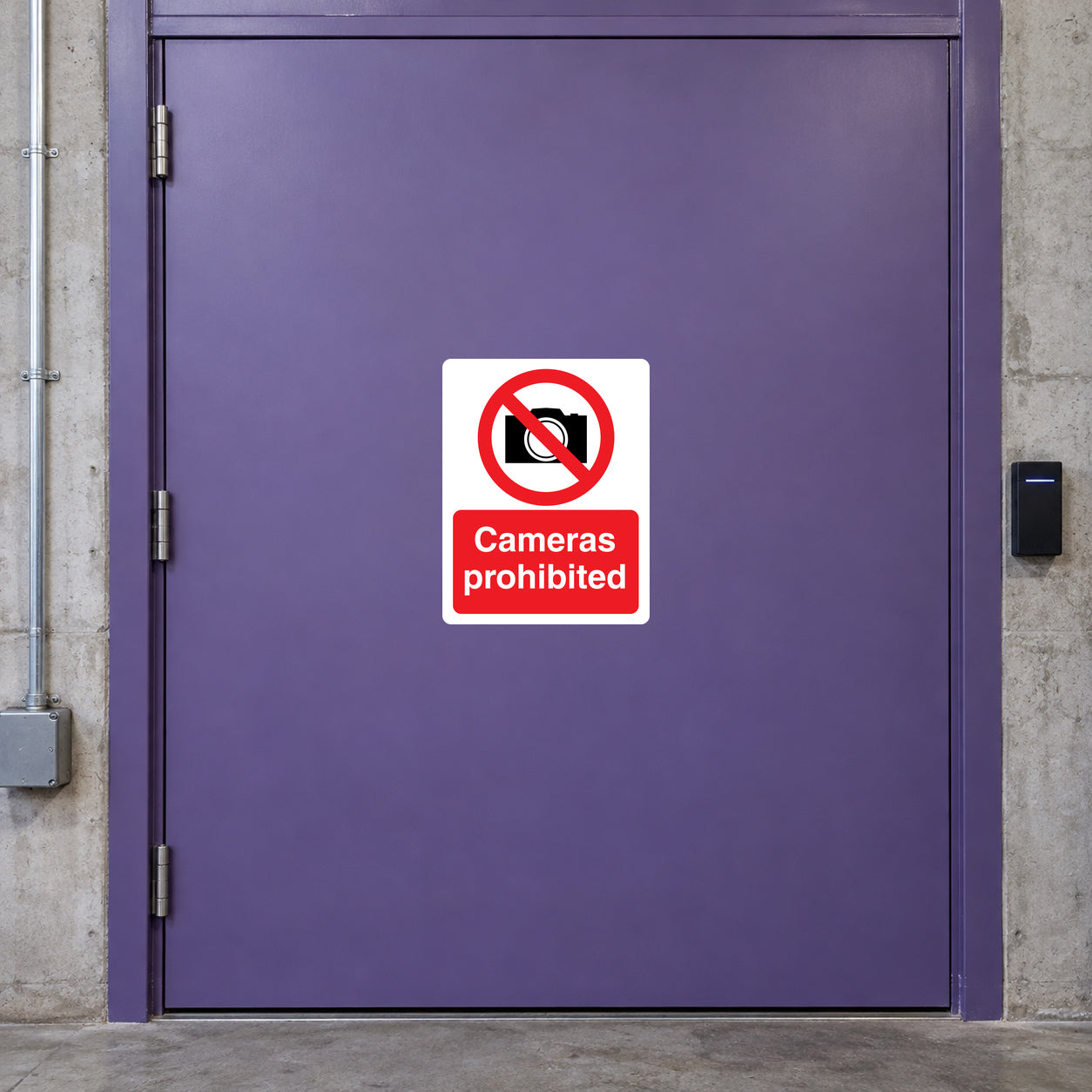 NO safety sign sticker with red circle-slash camera icon and text "Cameras prohibited"