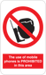 Mobile phone safety sticker with no-phone symbol and text: "mobile phones is PROHIBITED"
