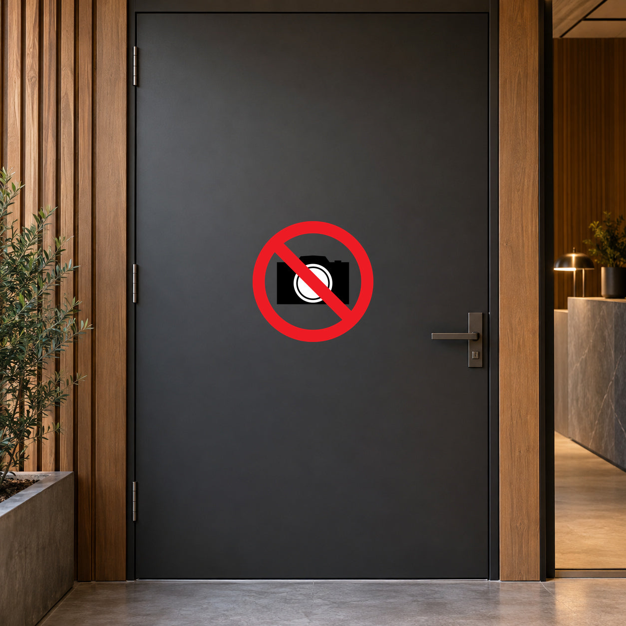 No safety sign sticker with red prohibition circle and slash over a black icon