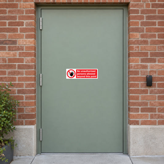 NO Safety Sign Sticker applied in secure printing production entrance, solid light sage door, brick surround and card reader far right