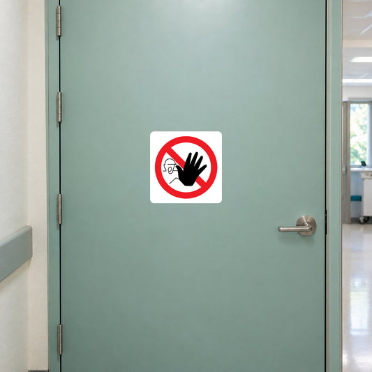 No Dogs sign sticker with white square and red circle slash symbol