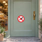 No Dog Fouling sticker displayed on a bakery entrance door