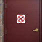 NO Dogs Sign Sticker applied in a solid burgundy restaurant service entrance door, brass lever far right, tiled jamb at far left