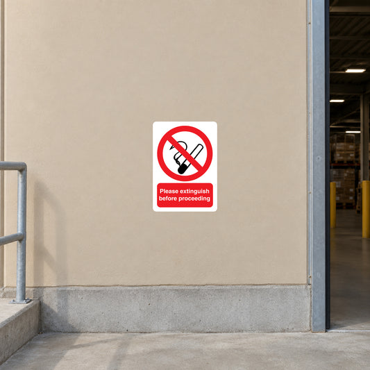 NO Smoking Sign Sticker applied in flat tan wall beside a factory entrance threshold, handrail extreme left