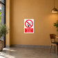 NO Smoking Sign Sticker applied in smooth ochre cafe foyer wall with an unoccupied chair far right