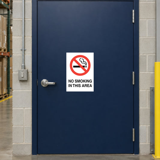 NO Smoking Sign Sticker applied in flat navy maintenance office door in a distribution center