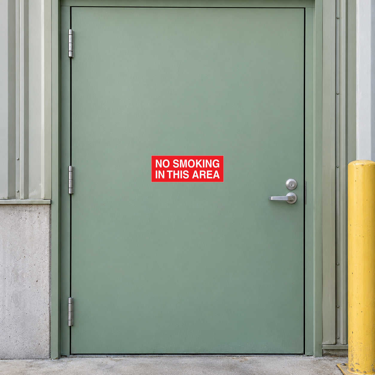 Red “NO SMOKING IN THIS AREA” sign sticker on a door