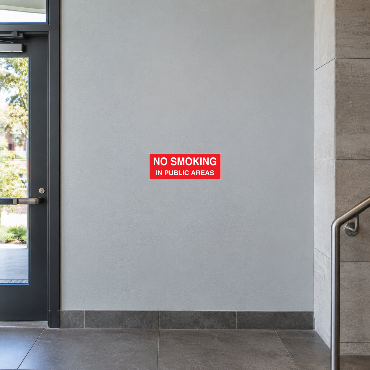 No smoking sign sticker, red with white text: “NO SMOKING” and “IN PUBLIC AREAS”