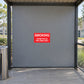 Red “SMOKING” sign sticker: “PERMITTED IN THIS AREA ONLY”