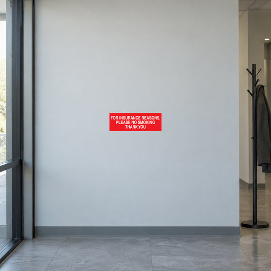 NO Smoking Sign Sticker applied in pale grey insurer office visitor entry wall, coat stand at far side