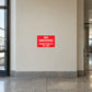 Red no smoking sign sticker with white text: NO SMOKING UNDER PENALTY OF LAW
