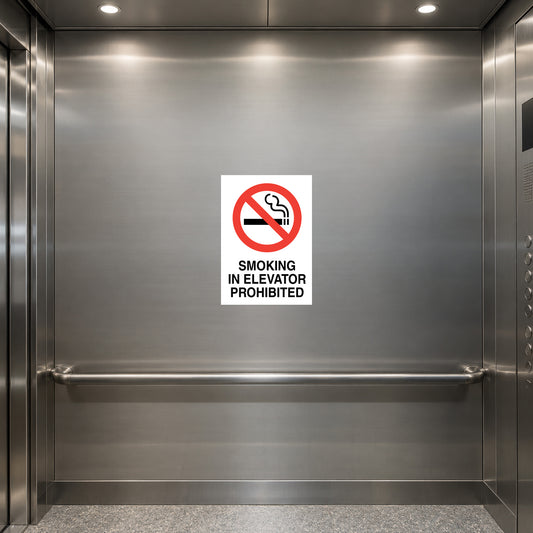 NO Smoking Sign Sticker applied in smooth stainless SIDE panel inside an empty passenger elevator, handrail entirely below y80%, door seams and controls at edges