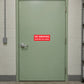 No smoking restricted area sign sticker, red text on white with red border