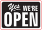 Business open/closed sign sticker with black background and white “YES WE'RE OPEN” text