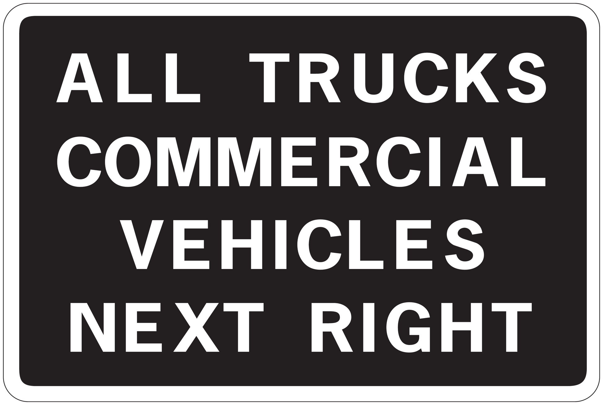 Road sign sticker with text "ALL TRUCKS COMMERCIAL VEHICLES NEXT RIGHT"