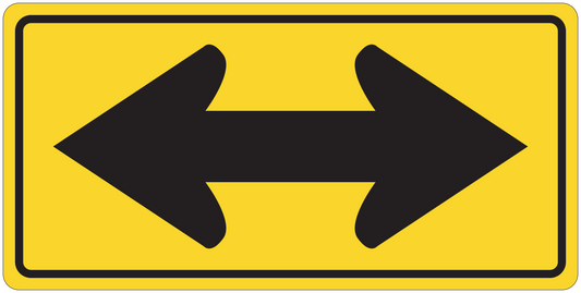 Traffic direction sign sticker with double black arrows on yellow background.