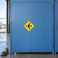 Road sign sticker with yellow diamond and black airplane symbol