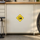 Road sign sticker: yellow diamond with crossed-out vehicle icon