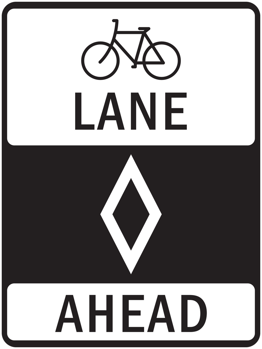 Road sign sticker with bicycle lane icons and text "LANE" and "AHEAD"